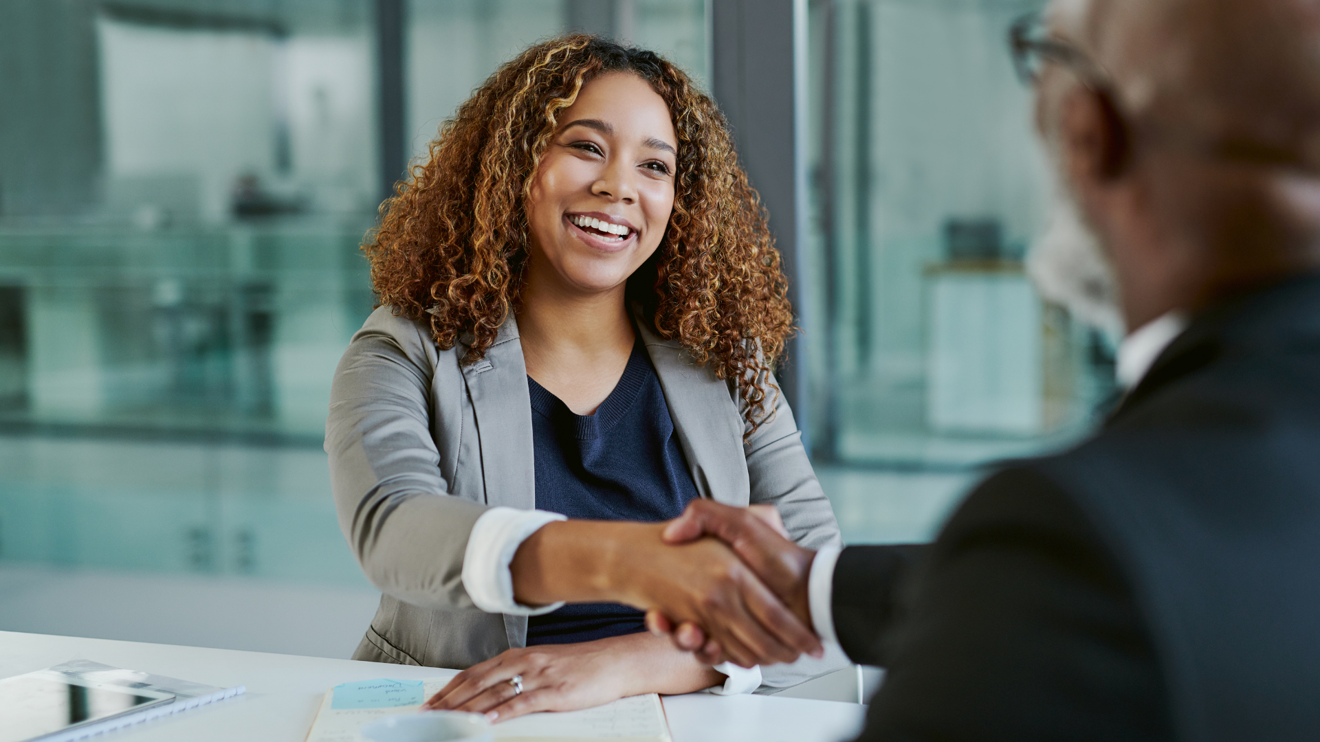 A mentor and mentee speaking to each other